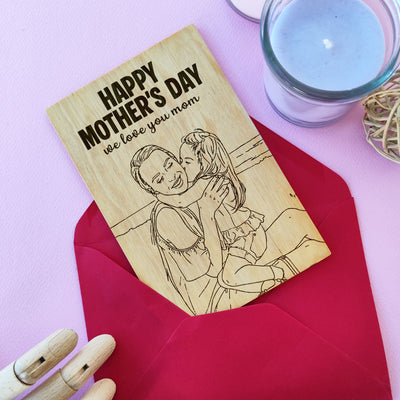 Laser engraved wooden greeting card with mother and child portrait — personalized Mother’s Day gift.