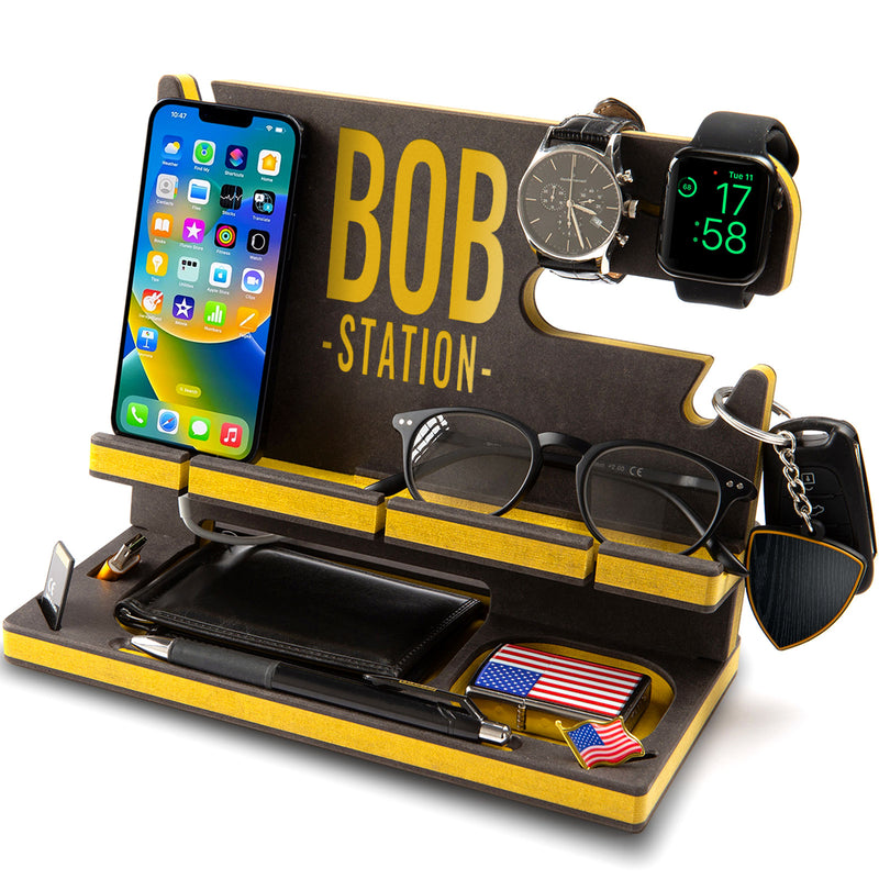 Black engineered wood docking station with yellow accents and a message in yellow, personalized birthday gift for dad