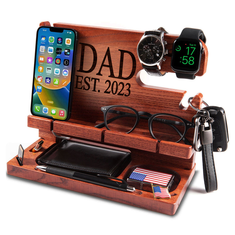 Deep maroon wood nightstand organizer displaying wallet and keys, thoughtful father&